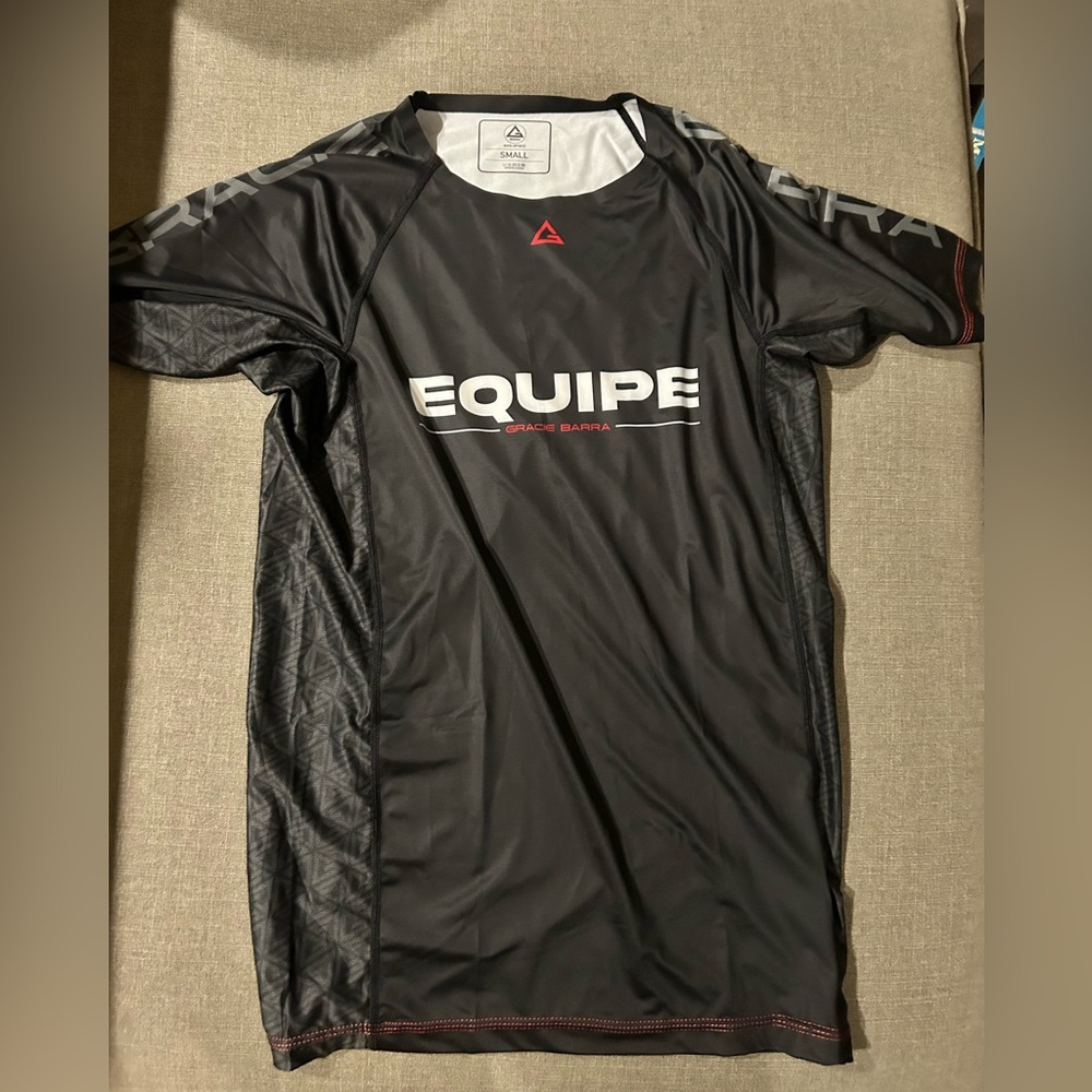 Equine black men’s/unisex training rashguard. Short sleeved.  Never worn. small